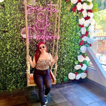 Con Azucar Cafe - Cute photo wall. The saying is pretty lame lol "Sit your ass" ? - Coffee & Tea Near Me - San Jose, California Con Azucar Cafe - Cute photo wall. The saying is pretty lame lol "Sit your ass" ? - Coffee & Tea Near Me - San Jose, California