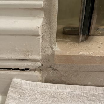 Mark Tile & Installation - Tile not long enough, slapped in a ton a grout instead getting the proper fit. - Tiling Near Me Mark Tile & Installation - Tile not long enough, slapped in a ton a grout instead getting the proper fit. - Tiling Near Me