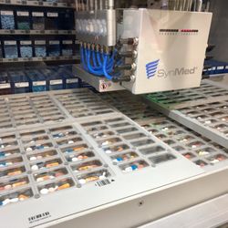 Our two robots help package multidose and single dose medications as accurately as possible with barcode scans at every step
