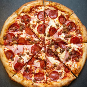 Pizza Salvatoré - a pepperoni and sausage pizza - Pizza Near Me - Quebec City, Quebec Pizza Salvatoré - a pepperoni and sausage pizza - Pizza Near Me - Quebec City, Quebec