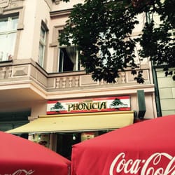 phönicia - Tables and Umbrellas outside