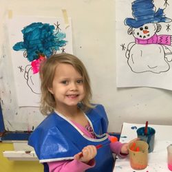 Noah's Ark Preschool and Play Park - A student enjoys the painting option for the day.