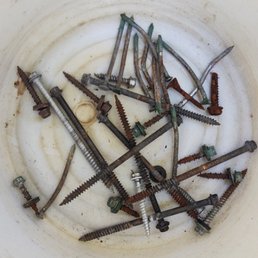 Screws and nails in my driveway when they finished.