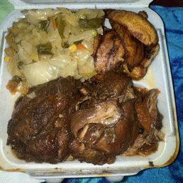 Brown stew chicken with cabbage and fried plantains Brown stew chicken with cabbage and fried plantains