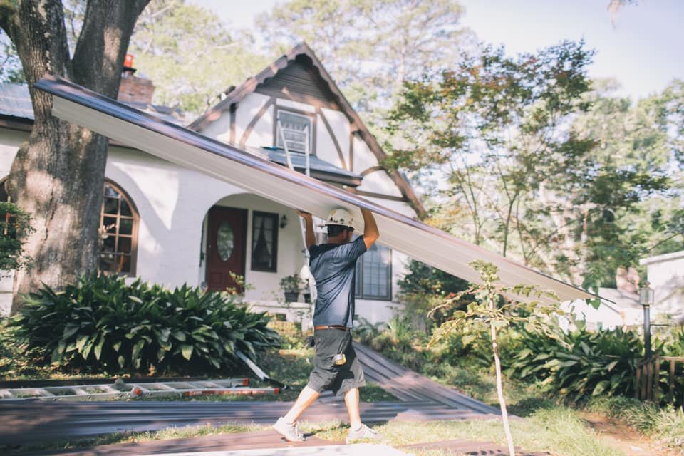 Slide of Tadlock Roofing