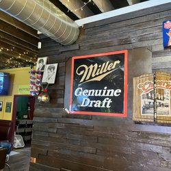 Circular Lounge - Dart board, funky old signs