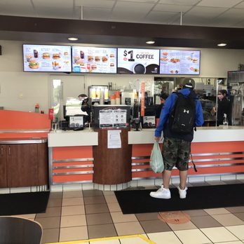 A&W - a man standing at the counter of a fast food restaurant - Burgers Near Me - Mississauga, Ontario A&W - a man standing at the counter of a fast food restaurant - Burgers Near Me - Mississauga, Ontario