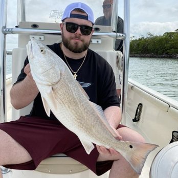 Dreamlander Tours - My son Chris with a 26" Red Fish - Fishing Near Me - Goodland, Florida Dreamlander Tours - My son Chris with a 26" Red Fish - Fishing Near Me - Goodland, Florida