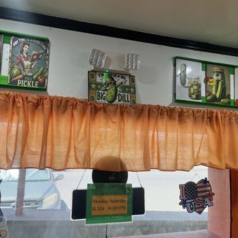 The Sizzling Pickle Eatery and Lounge - More funny art to go with great food! - American Near Me - Craig, Colorado