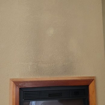 Beachcomber Motel - Filthy wall above fireplace - Hotels Near Me - Fort Bragg, California
