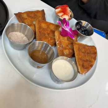 Eggy’s Neighborhood Kitchen - The churro waffles with the fixings on the side. - Breakfast & Brunch Near Me - Berkeley, California Eggy’s Neighborhood Kitchen - The churro waffles with the fixings on the side. - Breakfast & Brunch Near Me - Berkeley, California