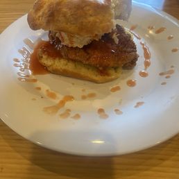 Pimento cheese and hot honey fried chicken biscuit. Pimento cheese and hot honey fried chicken biscuit.
