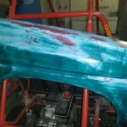 DeLange's Automotive - Junkyard fenders we were able to straighten and paint to color match the customers vehicle. (Before)