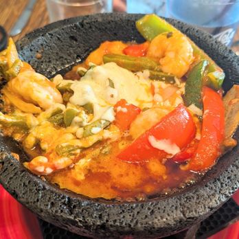 Frida's Cantina - Molcajete with shrimp - Mexican Near Me - Bangor, Michigan Frida's Cantina - Molcajete with shrimp - Mexican Near Me - Bangor, Michigan