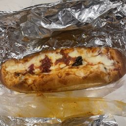 Meatball parmigiana sub. Meatball parmigiana sub.