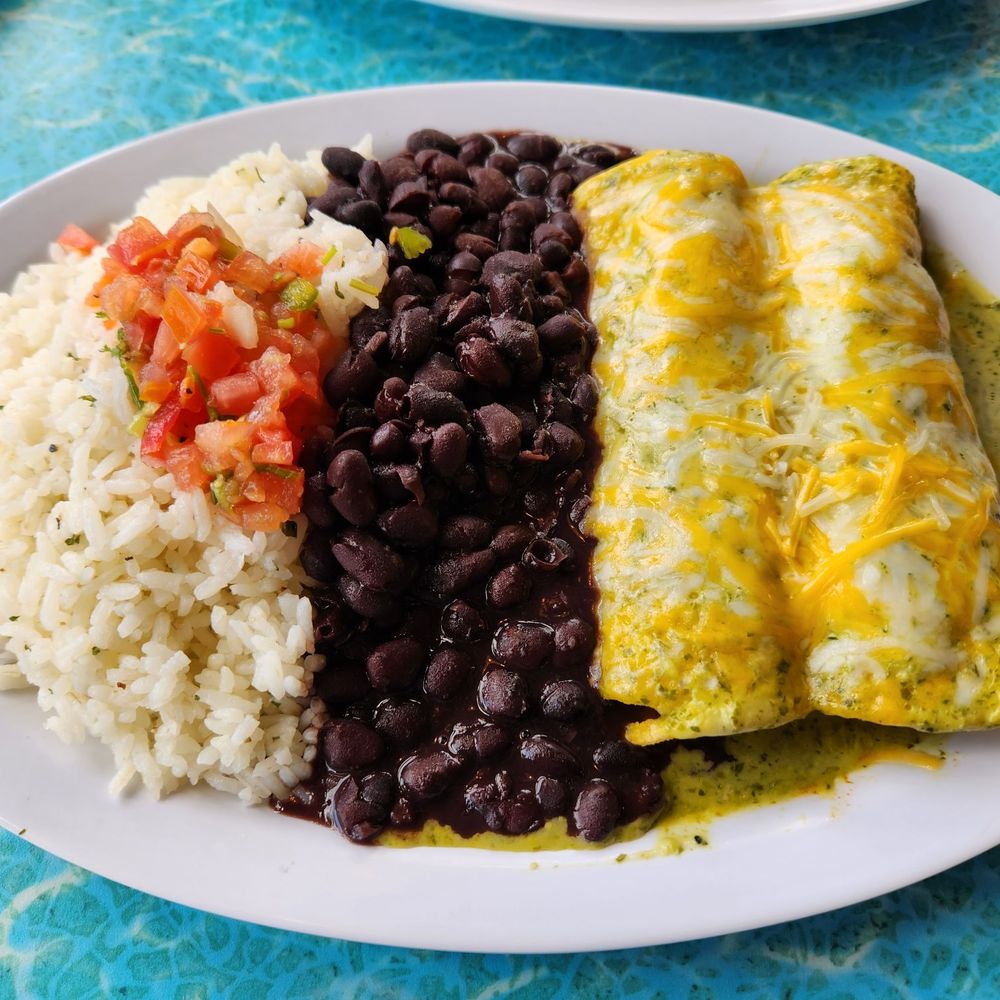 Wahoo's Fish Taco - number 2 enchiladas with blackened fish, green sauce, and black beans with white rice. - Mexican Near Me - Lake Forest, California