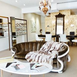 Robert Max Opticians - Take a seat while shopping for new frames!