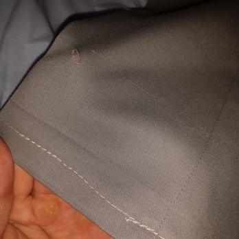Paradise Cleaners - They used white string to hem grey slacks, cut a 1/2 inch slit on both pant legs, and did an uneven stitch job. - Dry Cleaning Near Me - San Diego, California Paradise Cleaners - They used white string to hem grey slacks, cut a 1/2 inch slit on both pant legs, and did an uneven stitch job. - Dry Cleaning Near Me - San Diego, California