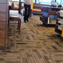 Village Inn - Management refuses to remove this chair from the main walkway. I asked them to move it, and management told me to walk around it.