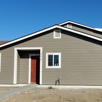 Modern Construction Group - a house with a red door - Siding Near Me - Roseville, California Modern Construction Group - a house with a red door - Siding Near Me - Roseville, California