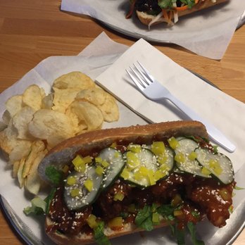 KoKyu Na'Mean - back: Roasted Belly Banh Mi + Seaweed Salad front: Pyongyang Hot Chicken + Chips - Sandwiches Near Me - Durham, North Carolina KoKyu Na'Mean - back: Roasted Belly Banh Mi + Seaweed Salad front: Pyongyang Hot Chicken + Chips - Sandwiches Near Me - Durham, North Carolina