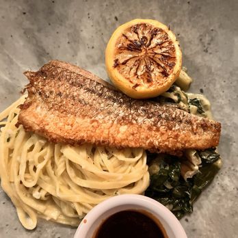 Pinzimini - Half of the seabass with linguini spinach and artichoke hearts - Italian Near Me - Rancho Mirage, California
