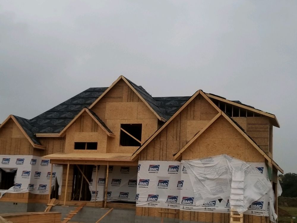 Slide of Longhorns Roofing