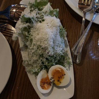 Il Nido - Chicories salad with anchovy dressing, soft boiled egg, parmesan - Italian Near Me - Seattle, Washington Il Nido - Chicories salad with anchovy dressing, soft boiled egg, parmesan - Italian Near Me - Seattle, Washington