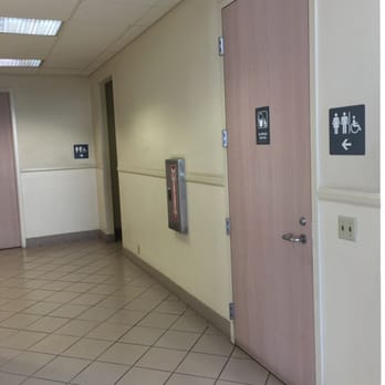 Palm Park - The bathroom area in the aquatic room next to the multipurpose room. - Tennis Near Me - Whittier, California
