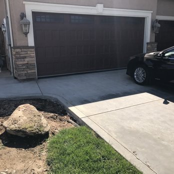 Ruiz Concrete Scapes - Perfectly paved driveway and walking path with excellent stone column work. - Masonry/Concrete Near Me Ruiz Concrete Scapes - Perfectly paved driveway and walking path with excellent stone column work. - Masonry/Concrete Near Me
