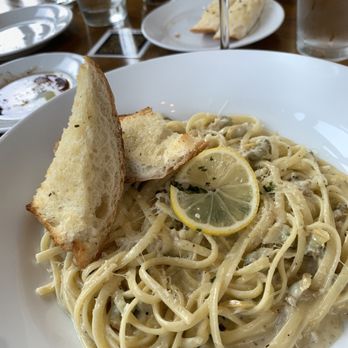 Amore Mio Trattoria - Delicious pasta with clams in a citrus sauce - Italian Near Me - Arlington, Texas Amore Mio Trattoria - Delicious pasta with clams in a citrus sauce - Italian Near Me - Arlington, Texas