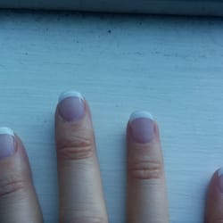 Famous Nails - What I got when I asked for french acrylics with a warm beige base. Glaring ridges in the white tips and PURPLE NAIL BEDS.