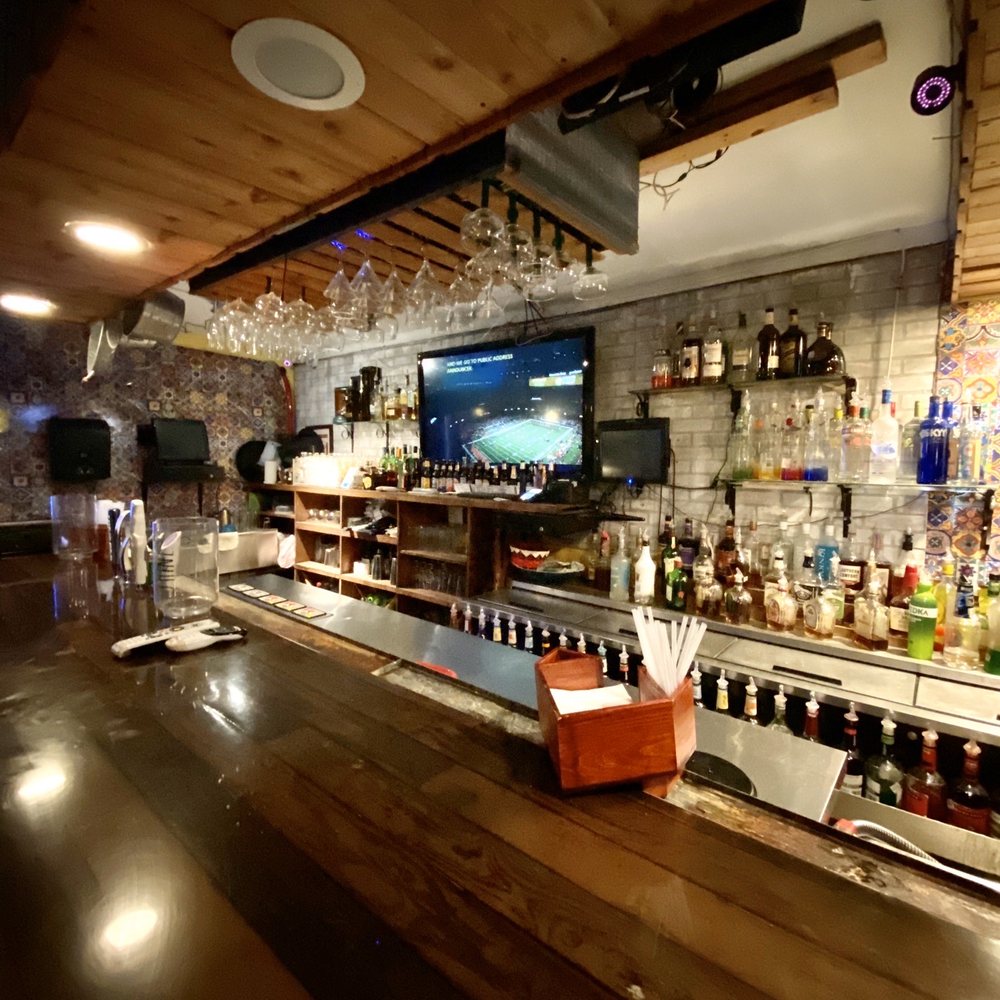La Cantina - a bar with bottles of alcohol - Tacos Near Me - Del Rio, Texas