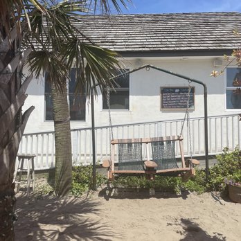 Idle Hour Biergarten - Cut lounge, rocking chairs outside area - Bars Near Me - Atlantic Beach, North Carolina Idle Hour Biergarten - Cut lounge, rocking chairs outside area - Bars Near Me - Atlantic Beach, North Carolina