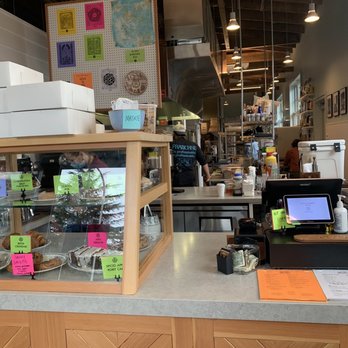 Saint Bread - Interior- cashier and kitchen behind. - Bakeries Near Me - Seattle, Washington