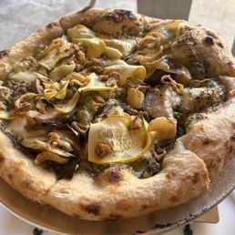 Pesto pizza... vegetarian. Delicious combination of mushrooms and squash. I enjoyed this more than the pepperoni. The crust hits Pesto pizza... vegetarian. Delicious combination of mushrooms and squash. I enjoyed this more than the pepperoni. The crust hits