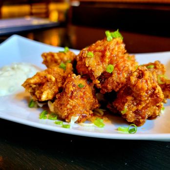 Yataimura Maru - a plate of fried food - Sushi Bars Near Me - Portland, Oregon Yataimura Maru - a plate of fried food - Sushi Bars Near Me - Portland, Oregon
