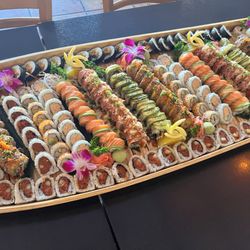 Thai Thai II - Order a custom sushi boat for your holiday party ! No budget too small.