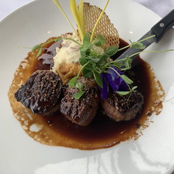 Hukilau Lanai - The medallions of beef in wine reduction. - Seafood Near Me - Kapaa, Hawaii Hukilau Lanai - The medallions of beef in wine reduction. - Seafood Near Me - Kapaa, Hawaii