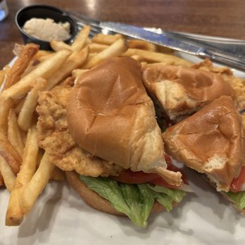 CONRAD'S Restaurant & Alehouse - Hand breaded loin. Yep I cut it first and tasted. Ate it all.  Come in and enjoy. - Chicken Wings Near Me - Liberty, Missouri