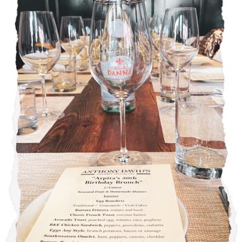 Anthony David's - a table setting with wine glasses and a menu - Breakfast & Brunch Near Me - Hoboken, New Jersey Anthony David's - a table setting with wine glasses and a menu - Breakfast & Brunch Near Me - Hoboken, New Jersey