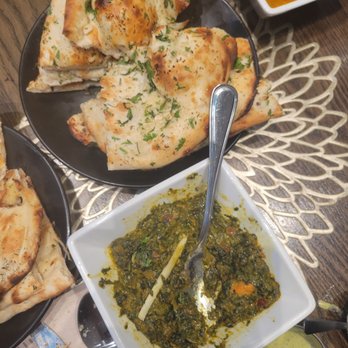 Yantra Kitchen - Chicken Saag and Garlic Naan  PS the pictures would have been better but we were to ready to eat. - Indian Near Me - Artesia, California