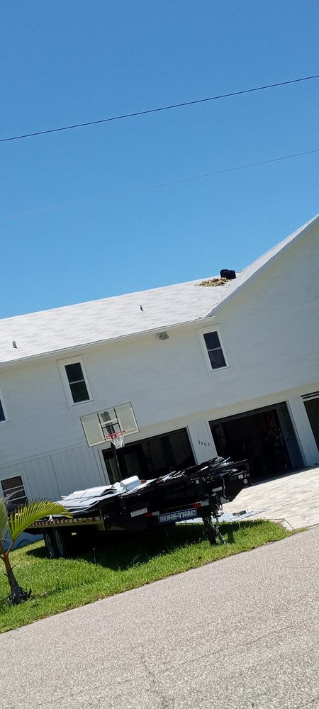 Slide of JG Helms Roofing