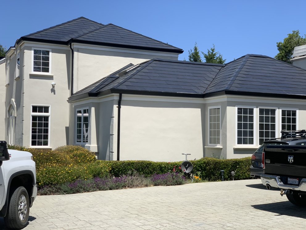 Slide of RidgeValley Roofing