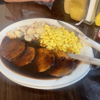 The Heidelberg - Sauerbraten with potato salad and spaetzle - German Near Me - Helen, Georgia The Heidelberg - Sauerbraten with potato salad and spaetzle - German Near Me - Helen, Georgia