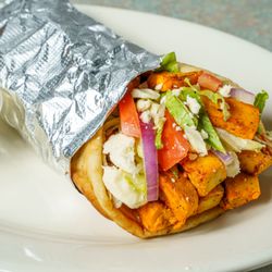 Anthony's Pizzeria - MEDITERRANEAN Seasoned Grilled Chicken in Pita Bread, Topped with Lettuce, Tomatoes, Red Onions, & Feta Cheese. Side of Tzatziki Sauce.
