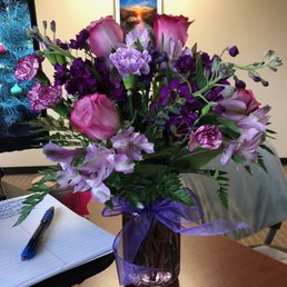 Entry level Birthday arrangement for my friend. Doesn't look exactly like the picture, but it is full and colorful! She loved it!