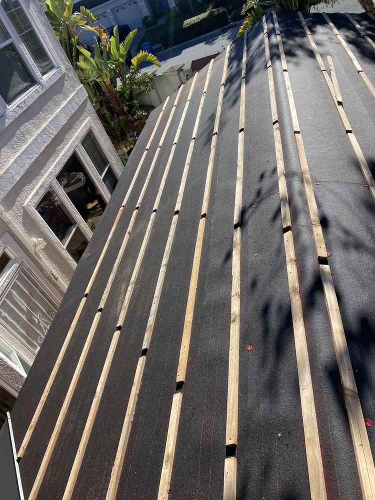 Slide of Rendon roofing