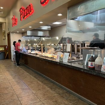 Lin’s International Buffet - a man standing in front of the counter - Buffets Near Me - Selma, Texas