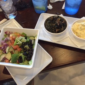 2 Creeks Bar & Grill - Side salad, collards, and Publix potato salad - Bars Near Me - St. Augustine, Florida